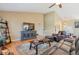Living room featuring hardwood floors, vaulted ceilings, and comfortable furniture for a cozy and inviting space at 2533 W 110Th Ave, Westminster, CO 80234