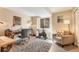 Bright home office space with a desk, exercise bike, and comfortable seating area at 2533 W 110Th Ave, Westminster, CO 80234