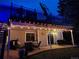 Inviting outdoor living space with covered patio, string lights, and stylish furniture for relaxing evenings at 2533 W 110Th Ave, Westminster, CO 80234