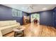 Cozy living room with stylish wood floors, natural lighting, and modern decor at 2233 Kearney St # 19, Denver, CO 80207
