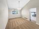 Dining room with neutral tones, carpet, and a window allowing natural light to fill the room at 18945 E 45Th Ave, Denver, CO 80249