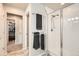 Bathroom featuring a glass-enclosed shower, and neutral walls at 18809 E 66Th Ave, Denver, CO 80249