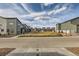 View of neighborhood featuring diverse home styles and green spaces at 18809 E 66Th Ave, Denver, CO 80249