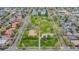 An aerial shot showcases the neighborhood park, with its vibrant green spaces and recreational amenities at 1090 E 3Rd Ave, Denver, CO 80218
