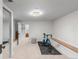 Spacious finished basement area with access to storage and stairs; perfect for exercise or recreation at 1090 E 3Rd Ave, Denver, CO 80218