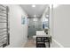 Modern bathroom with glass-enclosed shower, sleek fixtures, and heated towel rack for ultimate relaxation at 1090 E 3Rd Ave, Denver, CO 80218