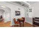 Cozy sitting room featuring charming architectural details, stylish furnishings, and natural light at 1090 E 3Rd Ave, Denver, CO 80218