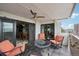 Balcony with fire pit table and comfortable seating at 2 Adams St # 705, Denver, CO 80206