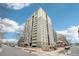 Modern high rise exterior featuring private balconies, updated landscaping and stunning city views at 2 Adams St # 705, Denver, CO 80206
