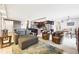 Cozy living room features open concept to kitchen and dining room, natural light, and modern finishes at 2 Adams St # 705, Denver, CO 80206