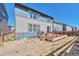 Spacious backyard with a large deck, perfect for outdoor entertainment and relaxation at 15818 E Otero Cir, Centennial, CO 80112