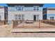 Backyard with spacious patio and wooden fence, creating a private outdoor space at 15818 E Otero Cir, Centennial, CO 80112