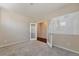 Home office with carpet flooring, white walls, and a dry erase board for productivity at 15818 E Otero Cir, Centennial, CO 80112