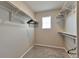 Walk-in closet with ample storage and natural light at 15818 E Otero Cir, Centennial, CO 80112