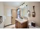 Bathroom with single sink vanity with drawers, and updated fixtures and towel rack at 107 N Harris St # 111, Breckenridge, CO 80424