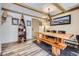 Rustic dining room with wooden table, bench, and unique decorative accents at 107 N Harris St # 111, Breckenridge, CO 80424
