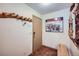 Entryway with tile flooring, coat rack, Breckenridge ski map and wood bench at 107 N Harris St # 111, Breckenridge, CO 80424