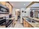Well-equipped kitchen with granite countertops, stainless steel appliances, and ample cabinet space at 107 N Harris St # 111, Breckenridge, CO 80424