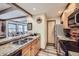 Modern kitchen with stainless steel appliances, granite countertops, and convenient layout at 107 N Harris St # 111, Breckenridge, CO 80424