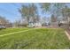 Large backyard with green grass, a shed, and a wooden fence, ideal for outdoor activities at 5510 S Windermere St, Littleton, CO 80120