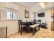 Cozy dining area with a wooden table, chairs, and a bench, perfect for Gathering meals at 5510 S Windermere St, Littleton, CO 80120