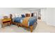 Bright bedroom featuring neutral carpet, light walls, closet space, and a large window for lots of light at 3942 Alcott St, Denver, CO 80211