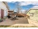 Back patio with privacy fence, concrete foundation, with ample space for dining and lounging at 3942 Alcott St, Denver, CO 80211