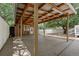 A large covered parking area in the backyard offers shade and protection from the elements at 6871 Locust St, Commerce City, CO 80022