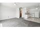 Open-concept kitchen and living room space featuring a functional and convenient layout at 12065 E Kentucky Ave, Aurora, CO 80012