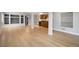 Expansive basement area with hardwood floors, built-in cabinets, and recessed lighting at 2749 Pemberly Ave, Highlands Ranch, CO 80126
