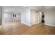 Expansive finished basement with modern flooring, recessed lighting, and access to extra rooms at 2749 Pemberly Ave, Highlands Ranch, CO 80126
