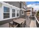 Spacious outdoor deck with dining set, offering a relaxing space for entertaining and enjoying the views at 2749 Pemberly Ave, Highlands Ranch, CO 80126