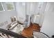 Aerial view showcasing the open-concept layout, hardwood floors, and abundant natural light in the living areas at 2749 Pemberly Ave, Highlands Ranch, CO 80126