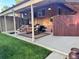Brick home exterior featuring patio with room for outdoor dining and entertaining at 2989 S Corona St, Englewood, CO 80113