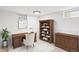 Basement home office with wood furnishings, neutral decor, and a comfortable workspace at 2989 S Corona St, Englewood, CO 80113