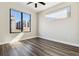 Bright bedroom with two large windows that offer plenty of natural light and outside views at 3017 W 53Rd Ave, Denver, CO 80221
