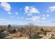 This view shows the vast landscape and city in the distance at 3017 W 53Rd Ave, Denver, CO 80221