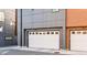 Two car garage with a modern design at 3017 W 53Rd Ave, Denver, CO 80221