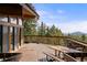 Spacious wooden deck features great mountain views at 4923 Snowberry Ln, Evergreen, CO 80439