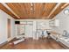 Spacious interior featuring wooden ceilings and natural light at 4923 Snowberry Ln, Evergreen, CO 80439