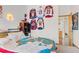 Bedroom features sports memorabilia with ensuite access at 343 W Lehow Ave # 22, Englewood, CO 80110