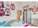 Bedroom featuring sports memorabilia at 343 W Lehow Ave # 22, Englewood, CO 80110