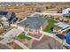 Aerial view of a home showcasing the backyard, landscaping, and outdoor features like a trampoline at 20783 E 50Th Pl, Denver, CO 80249