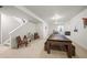 Spacious finished basement with ping pong table and sitting area at 20783 E 50Th Pl, Denver, CO 80249