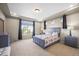 Bright main bedroom with neutral tones and view to the outside at 20783 E 50Th Pl, Denver, CO 80249