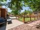Inviting backyard with patio furniture, raised garden, and a garden shed at 10109 W 68Th Ave, Arvada, CO 80004