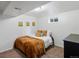 Comfortable bedroom with a queen bed and natural light from the window at 10109 W 68Th Ave, Arvada, CO 80004