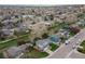 View of a suburban neighborhood with well-maintained houses and green spaces, aerial view at 9340 W Burgundy Ave, Littleton, CO 80123