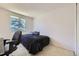 Spare bedroom featuring neutral walls and carpet, plus a large window at 10890 Stuart Ct, Westminster, CO 80031