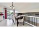 Bright dining area featuring tiled floors and sliding glass doors leading to an outdoor space at 10890 Stuart Ct, Westminster, CO 80031